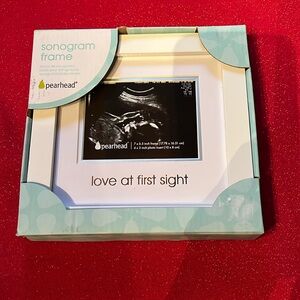 Pearhead Sonogram frame with wording “Love at first sight”. New in box.